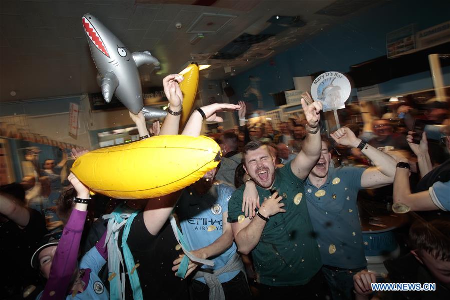 (SP)BRITAIN-MANCHESTER-PREMIER LEAGUE-MANCHESTER CITY-FANS-CELEBRATION