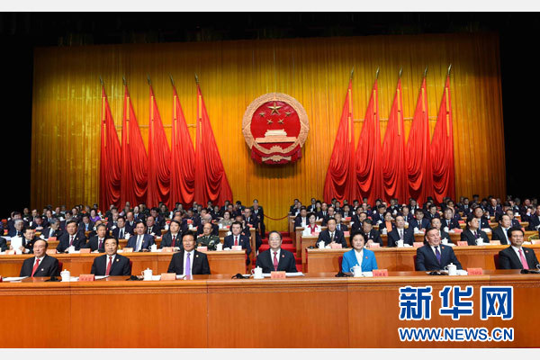 10月1日，慶祝中華人民共和國成立66周年暨新疆維吾爾自治區(qū)成立60周年大會在新疆人民會堂隆重舉行。 新華社記者 饒愛民 攝