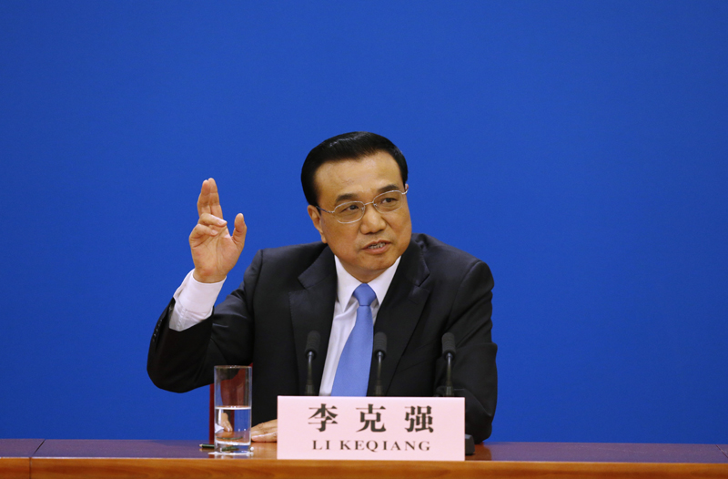 3月15日，國務院總理李克強在北京人民大會堂與中外記者見面，并回答記者提問。 新華社記者 沈伯韓 攝