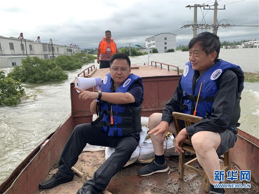 (新華全媒頭條·圖文互動)(1)筑起共御水患的鋼鐵長堤——戰(zhàn)洪一線的“干群關系新答卷”