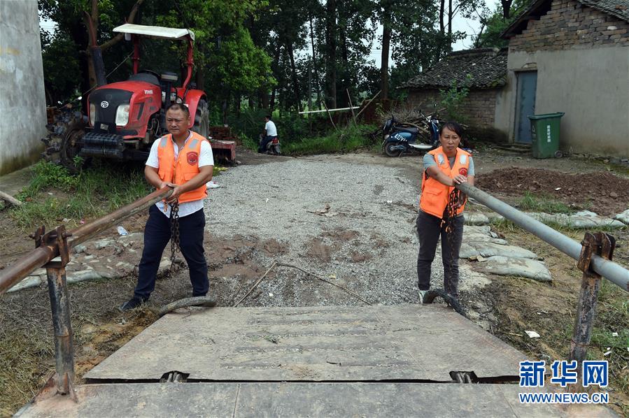 (新華全媒頭條·圖文互動)(7)筑起共御水患的鋼鐵長堤——戰(zhàn)洪一線的“干群關系新答卷”