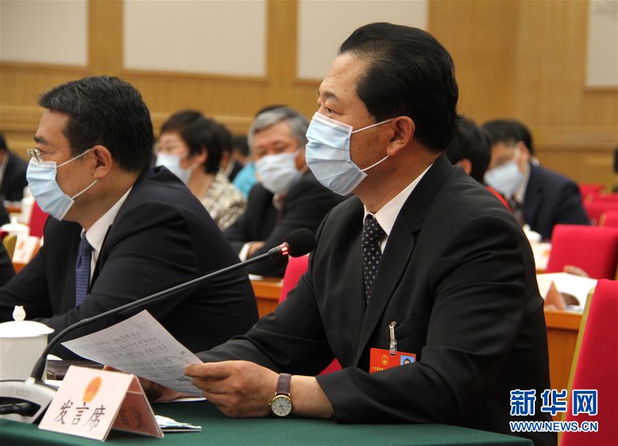 （兩會&middot;熱點(diǎn)畫報）（11）代表委員建言統(tǒng)籌做好經(jīng)濟(jì)社會發(fā)展工作