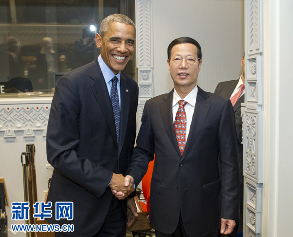 9月23日，國家主席習(xí)近平特使、國務(wù)院副總理張高麗在紐約會見出席聯(lián)合國氣候峰會的美國總統(tǒng)奧巴馬。 新華社記者王曄攝