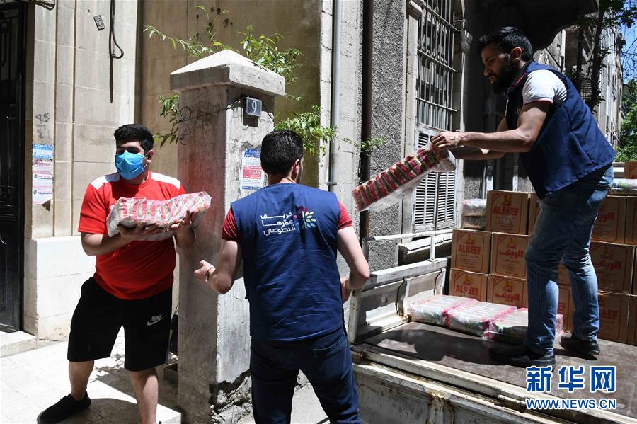 （國際疫情&middot;圖文互動）（2）通訊：疫情中，那抹笑容最難忘&mdash;&mdash;記向困難家庭發(fā)放愛心包裹的敘利亞青年志愿者