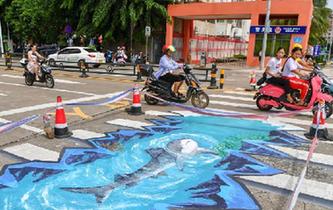 &ldquo;海洋世界&rdquo;3D立體斑馬線亮相?？? />  
<div>“海洋世界”3D立體斑馬線亮相海口</div>
</a> 
</div>
<div   id=